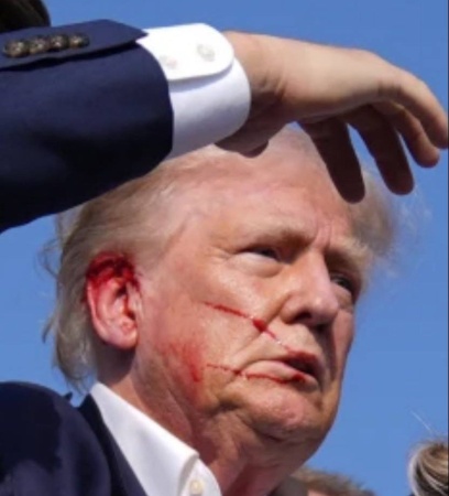 Suspect in Trump assassination attempt charged with gun crimes