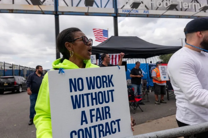 US dockworkers press on with second day of strike, with no deal in sight