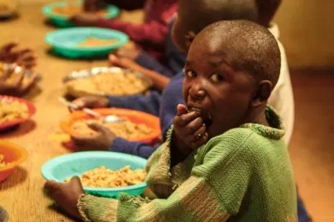 Hunger: Children scavenge for leftovers at parties, prayer houses