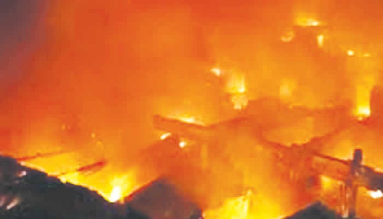 Hoodlums pelt fire fighters as inferno razes Niger market