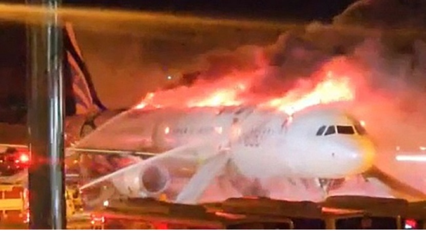 BREAKING: Plane with 176 on board catches fire at airport
