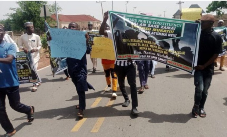 Suspended Zamfara Assembly members protest in Abuja
