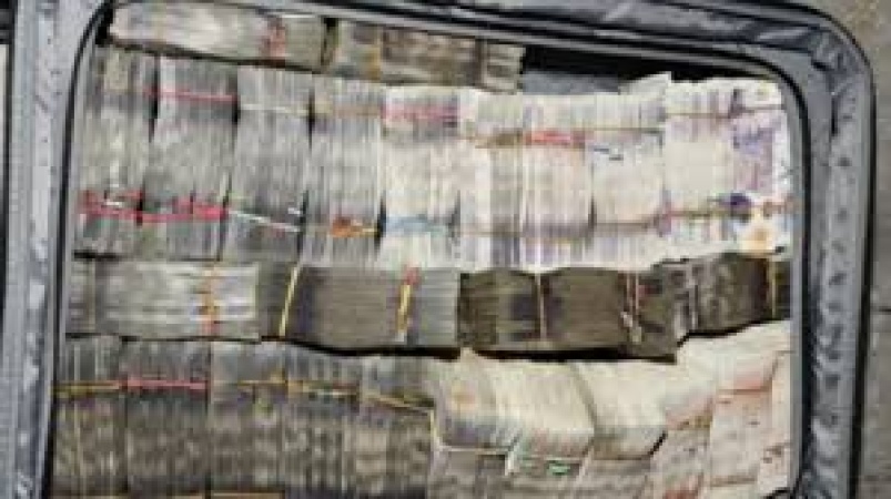 Man arrested at Heathrow airport over ?400,000 in suitcase