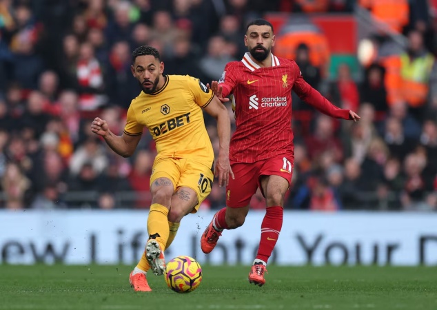 Liverpool beat Wolves to go seven points clear at top