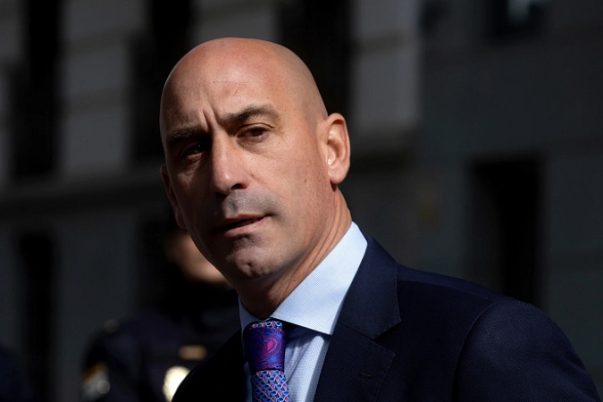 Ex-soccer boss fined ?10,000 over kiss without consent