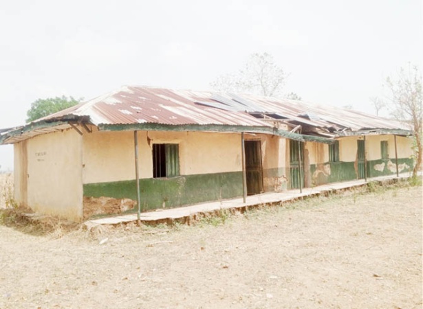 Wike must hear this: Pupils sit on bare floor, teachers on window in Abuja school