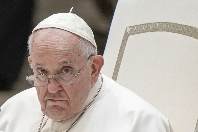 Pope Francis wears black pants, not papal attire, in surprise visit to St. Peter's