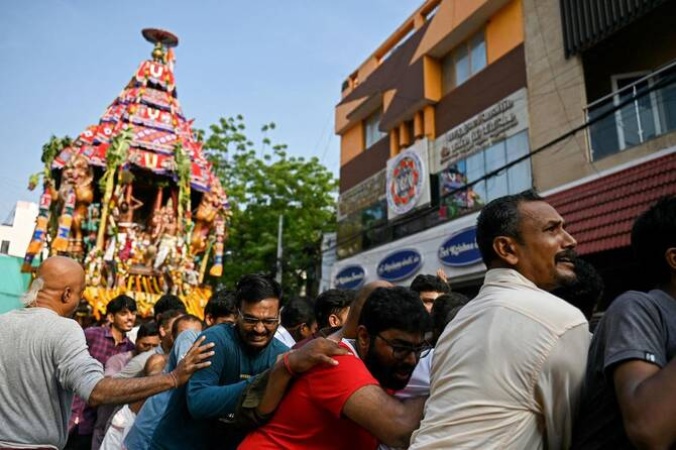 Six killed, dozens injured in India temple stampede