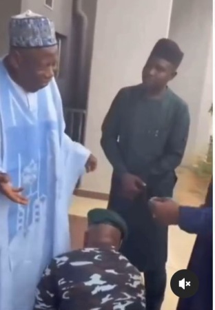 Policeman under fire for lacing Ganduje?s shoe