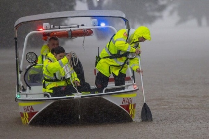 Four dead, several missing in record Australia flooding