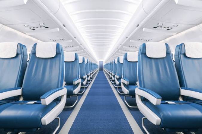 Man abandons grieving partner in economy after getting a free upgrade to business class on 14-hour flight