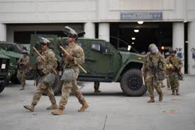 Soldiers deployed by Trump arrive in LA to crush immigration protests
