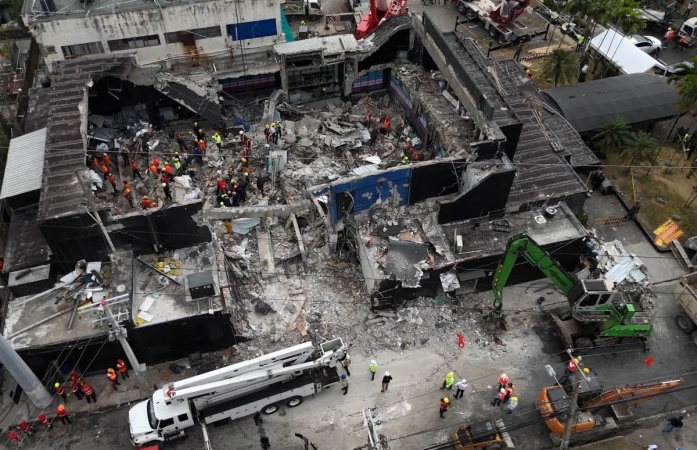 Owners of collapsed nightclub arrested for death of 236