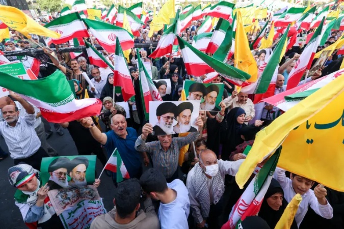 Iran moves to punish ?spying? as it proclaims victory over Israel, US