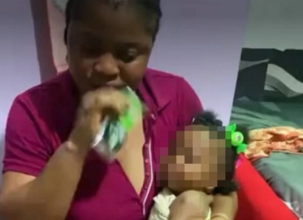 Police investigate viral video of woman feeding baby ?Action Bitters?
