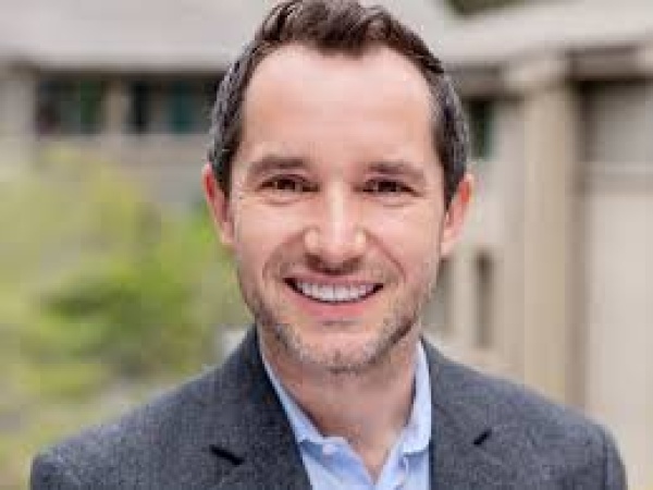 Professor gunned down in broad daylight while visiting his children