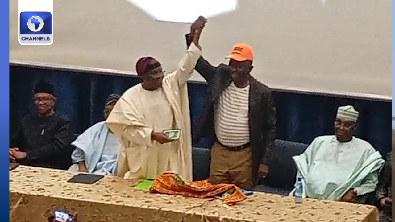 [JUST IN]: Coalition: Ex-ADC National Chair hands over, presents membership cards to Mark, Aregbesola