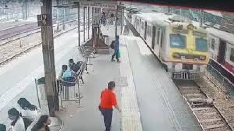 Man jumps on to moving high-speed train