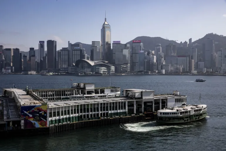 Hong Kong cancels passports, bans financial support for wanted activists