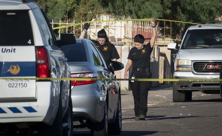 Death and sorrow as gunman opens fire at US immigration facility