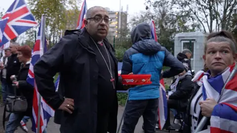 Tommy Robinson supporters are turning to Christianity, leaving the Church in a dilemma