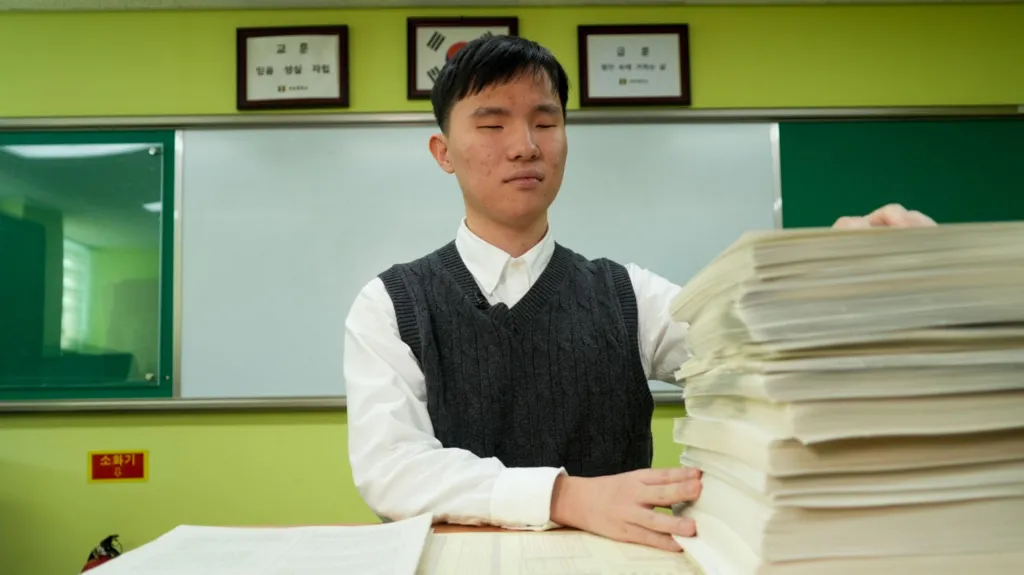 Thirteen hours by touch ? inside one of the world's longest exam days
