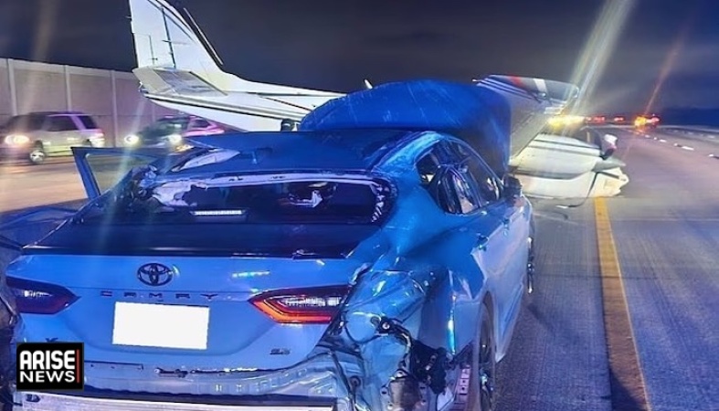 Plane collides with car during emergency landing on highway