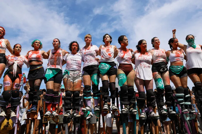 ‘Stop killing us’: Huge crowds rally in Brazil, decrying rise in femicide