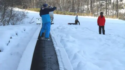 Five-year-old boy dies after getting caught in Japan ski travelator
