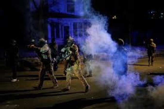 A federal judge orders ICE to stop arresting and pepper-spraying peaceful protesters