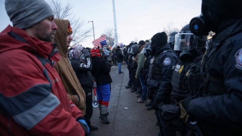 US govt officials spit fire as protesters disrupt church service