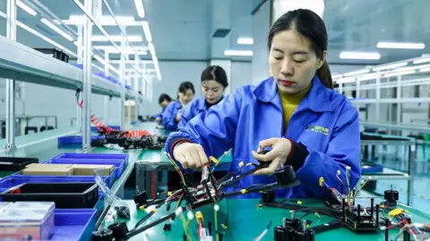 China announces record $1tn trade surplus despite Trump tariffs