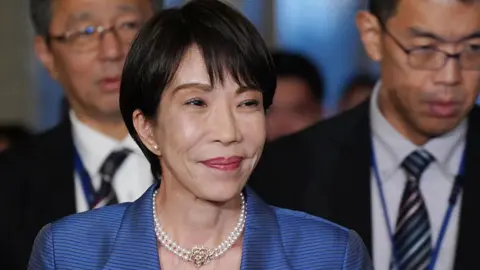 Japan PM joins fight for more female toilets in parliament