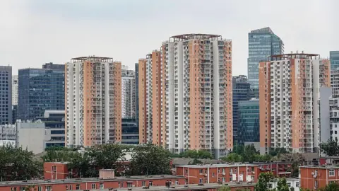 China bans storing cremated remains in empty 'bone ash apartments'