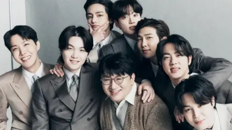 Why police are seeking to arrest billionaire K-pop mogul behind BTS