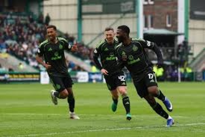 Celtic edge past 10-man Hibs to go joint top