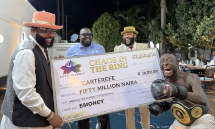 E-Money presents N50m cheque to Carter Efe after celebrity boxing win