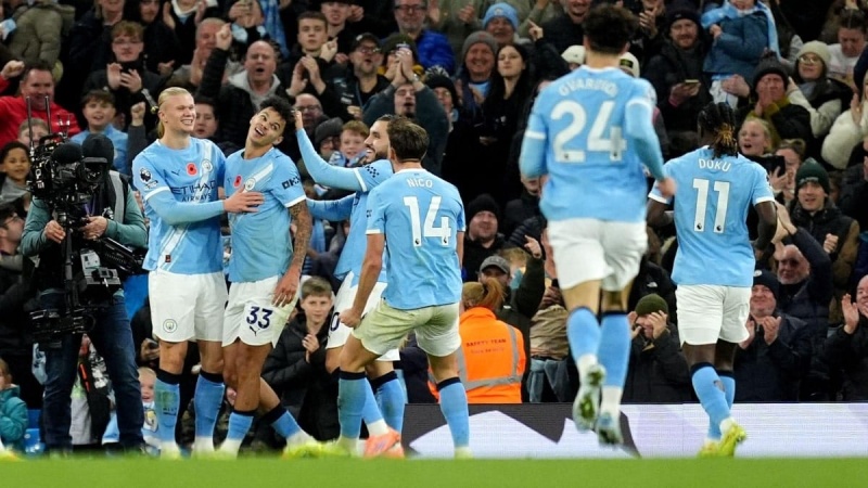 Man City move two points behind leaders Arsenal with win over Brentford