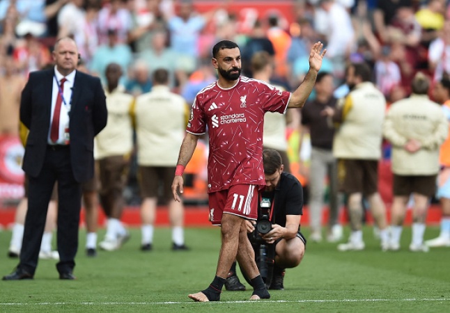Liverpool clinch Champions League spot on day of farewells