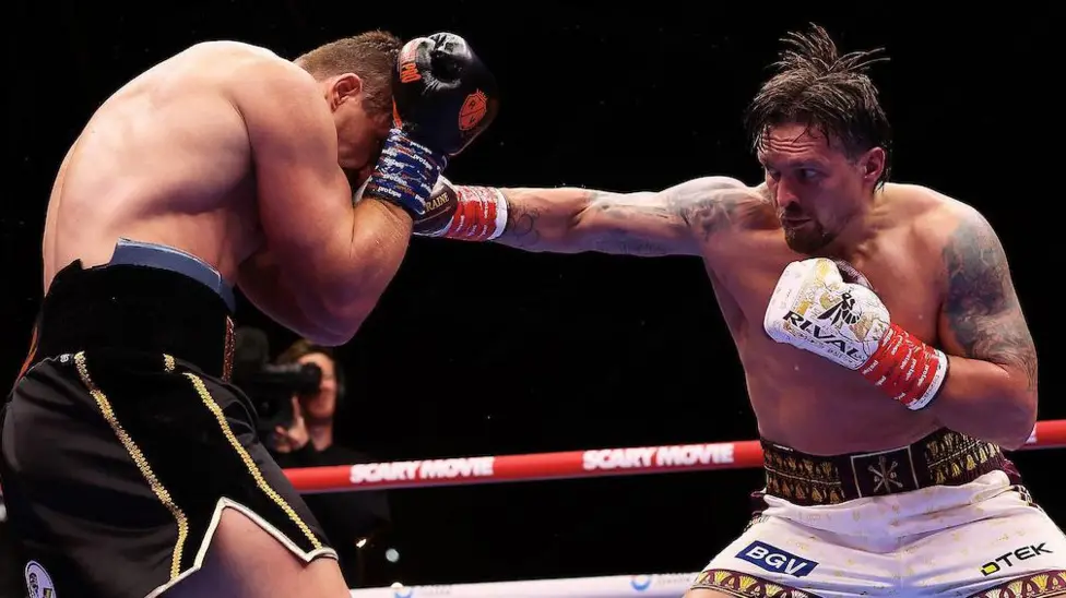 Usyk retains  world heavyweight boxing titles with controversial Verhoeven stoppage