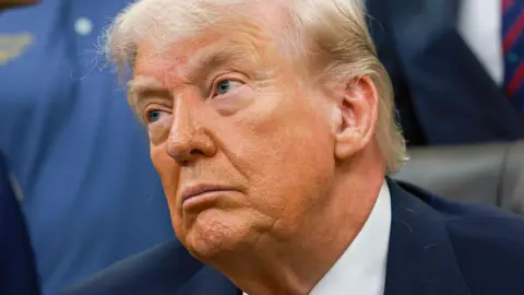 US aviation worker accused of using work computer to threaten Trump