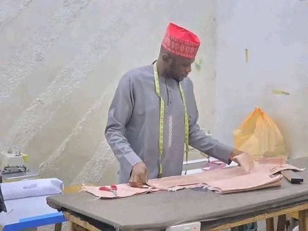 Local government chairman resumes work as a tailor after losing seat