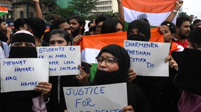 India files charges against 13 over medical exam paper leak scandal