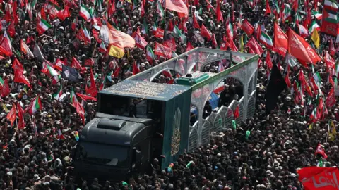 Huge crowds fill Tehran streets for Khamenei's funeral procession