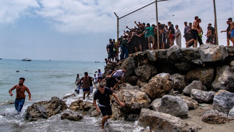 Spain says most of the 50,000 migrants who crossed into its territory from Morocco have returned
