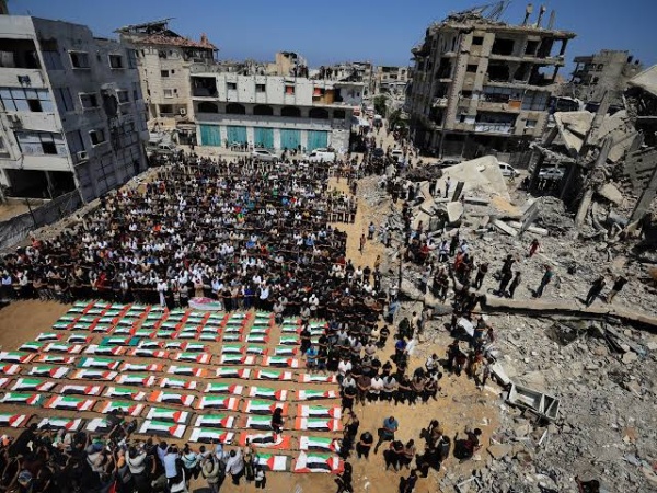 Mass funeral in Gaza for 112 Palestinians killed in 2023 Israeli strike