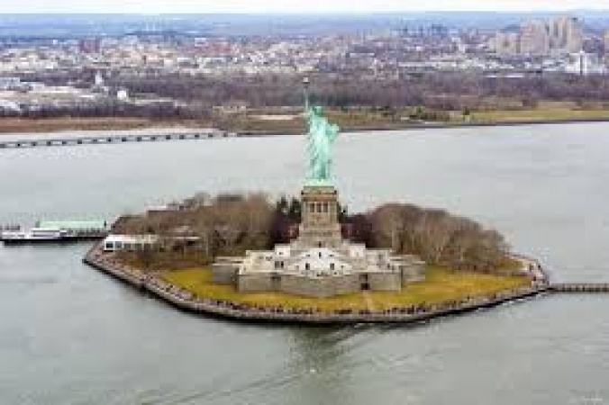 Man arrested after boat capsizes near Statue of Liberty killing woman and infant