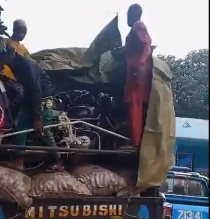 15 passengers found hidden under truck cover, driver jailed