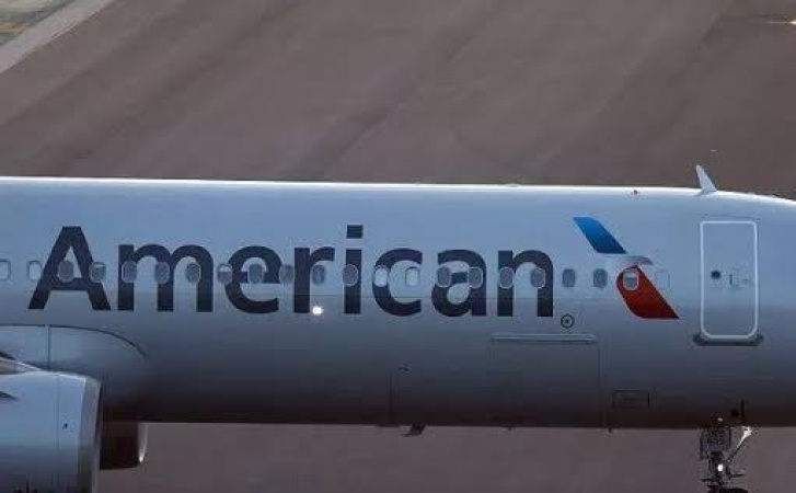 Laptop catches fire on US flight, passenger treated at airport