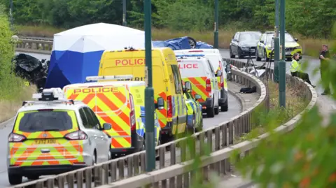 Two police officers among seven killed in pursued car crash